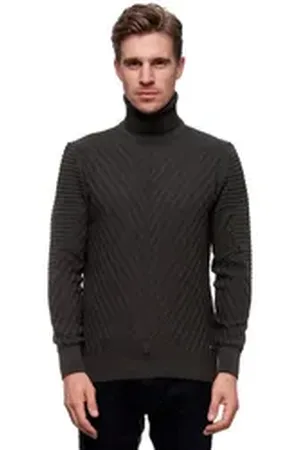 Rusty Neal Rollkragenpullover in stilvollem Feinstrick braun M