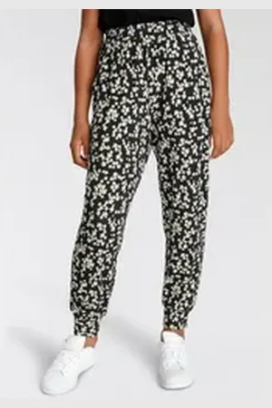 Kidsworld Haremshose Viskosehose allover gemustert mit Blumen bedruckt schwarz 152/158