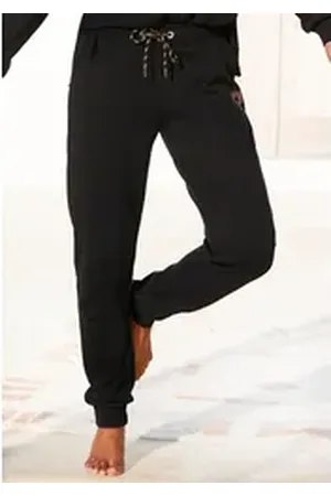 Buffalo Sweathose Loungehose mit seitlichen Taschen und kleinem Druck, Loungewear schwarz 32/34