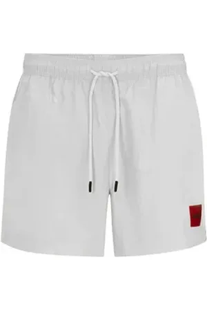 HUGO BOSS Badeshorts Dominica mit großem Marken-Patch am linken Bein weiß M