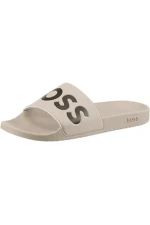 HUGO BOSS Aryeh Slid Badepantolette, Poolslides, Schlappen, Strandschuh, Sommerschuh mit Logoschriftzug beige|schwarz 41 EU