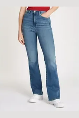 Tommy Hilfiger Schlagjeans SYLVIA - High waist - Flared Denim Jeans mit Logostickereien und Nieten blau 28