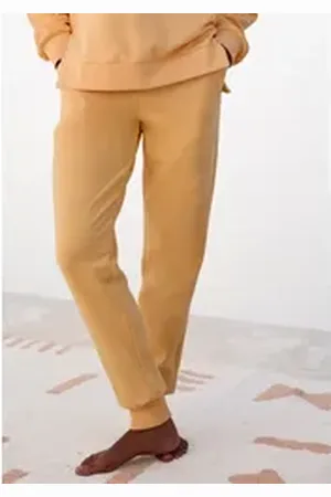 Buffalo Sweathose Loungehose mit seitlichen Taschen und kleinem Druck, Loungewear gelb 32/34