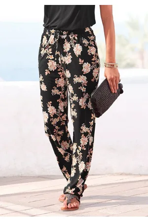 Lascana Strandhose mit floralem Alloverdruck und Taschen, elastisch, lockere Passform