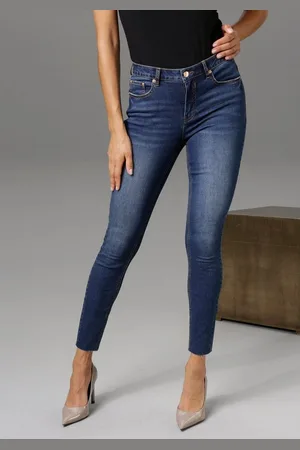 Aniston Skinny-fit-Jeans regular waist - mit ausgefransten Beinabschluss