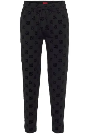 HUGO BOSS Sweathose Flock AOP Pants 10253410 01 mit integriertem Tunnelzug