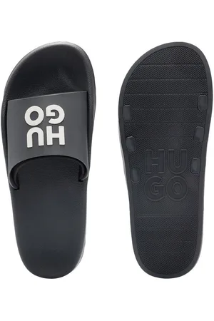 HUGO BOSS Nil Slid Badepantolette mit weichem Textil-Innenfutter - Verkäufer: bonvenon