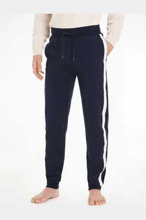 Tommy Hilfiger Jogginghose HWK TRACK PANT mit Logo-Seitenstreifen