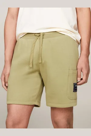 Tommy Hilfiger Sweatshorts FLAG LOGO BADGE SWEATSHORTS Mit Tasche an der Seite