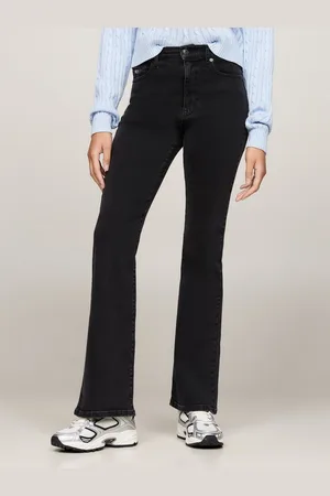 Tommy Hilfiger Schlagjeans SYLVIA - High waist - Flared Denim Jeans mit Logostickereien und Nieten