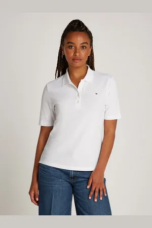 Tommy Hilfiger Poloshirt 1985 Regular Fit Pique Premium Polo mit Logo-Stickerei, mit Seitenschlitzen