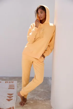 Buffalo Sweathose Loungehose mit seitlichen Taschen und kleinem Druck, Loungewear
