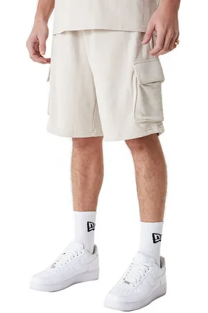 New Era Cargoshorts Herren Shorts NE ESSENTIALS CARGO SHORT Stonewhite - Verkäufer: Fashioncode