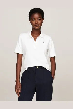 Tommy Hilfiger Poloshirt 1985 Regular Fit Pique Premium Polo mit Logo-Stickerei, mit Seitenschlitzen