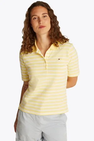 Tommy Hilfiger Poloshirt 1985 Regular Fit Pique Premium Polo mit Logo-Stickerei, mit Seitenschlitzen