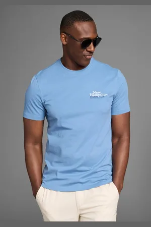 DELMAO T-Shirt mit dezentem Logo-Schriftzug im Club-Design