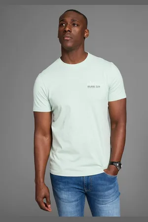 DELMAO T-Shirt mit dezentem Logo-Schriftzug im Club-Design