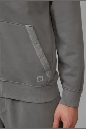 QS by s.Oliver Allwetterjacke Sweatjacke mit Garment Dye und Kapuze im Fabricmix Label-Patch - Verkäufer: