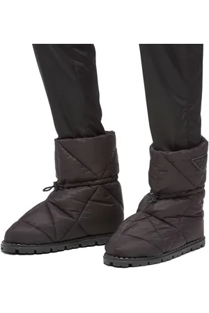 Prada Puffer Boots Gesteppte Stiefeletten mit Kordelzug Winterboots Gestepptes, wattiertes Design,Kordelzug mit Stopper am Knöchel - Verkäufer: eldigo