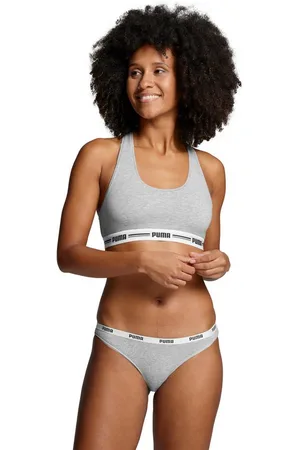 PUMA Sport-Bustier WOMEN RACER BACK TOP 1P HANG mit markantem Logobund