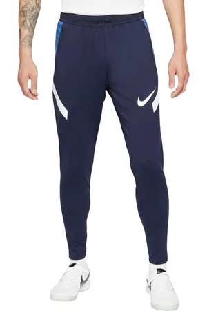 Nike Strike 21 Herren Trainings-Hose mit DRI-FIT-Technologie leichte Sport-Hose mit Marken-Logo Jogging-Hose mit FLYVENT-Bund Slim Fit CW5862-451 Dunkelblau/Weiß