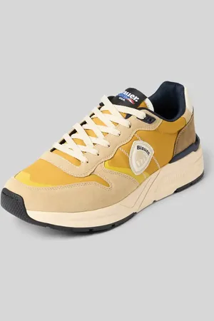 Blauer Sneaker mit Label-Patch Modell 