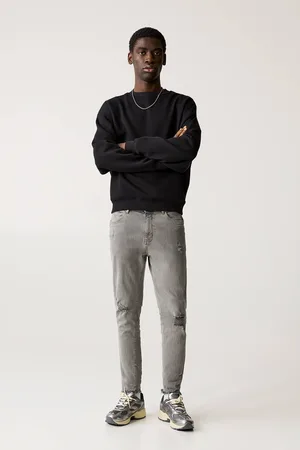Pull&Bear Carrot Fit Jeans Mit Zierrissen