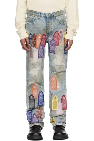 Who Decides War Blue Patch Arched Repaired Distressed Jeans