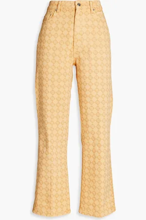 Nanushka Hoch sitzende Kick-flare-Jeans mit Logoprint - Neutral - 25