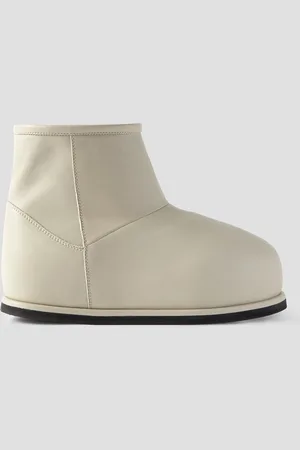 Amina Muaddi Heidi Ankle Boots aus Leder mit Plateau und Shearling-Futter - Weiß - EU 37