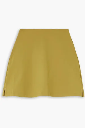 GIRLFRIEND COLLECTIVE Compressive Tennis-Rock aus recyceltem Stretch-Material - Gelb - XXS