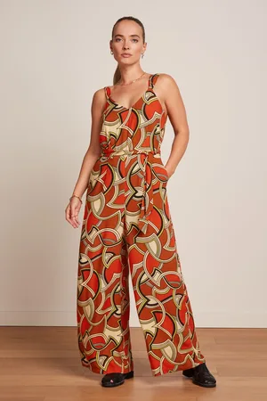 King Louie Lenny Mellow Dobby Jumpsuit in Spicy Orange.