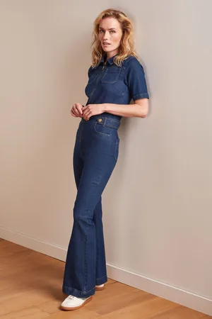 King Louie Flare Onyx Denim Jumpsuit in tiefem Blau.