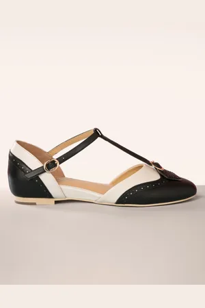 Charlie Stone Parisienne T-Strap Schuhe in Schwarz und Creme