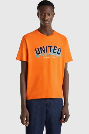 Benetton Orangefarbene Baumwoll-t-shirt Mit Dunkelblauem Logo